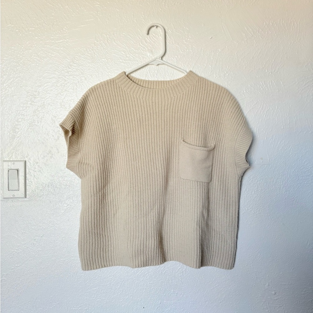 Ugerlov Cream Knit Short Sleeve Top, 78% Merino wool, 22% Acrylic. Size Medium